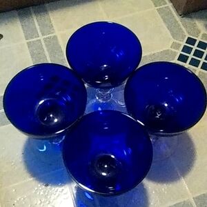 Set of 4 Louie gobblets.  Blue clear stem